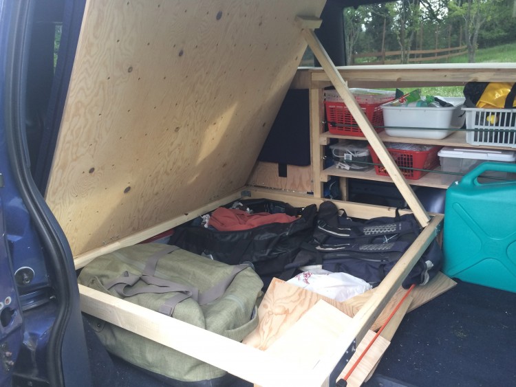 Bed hinged to allow access to storage