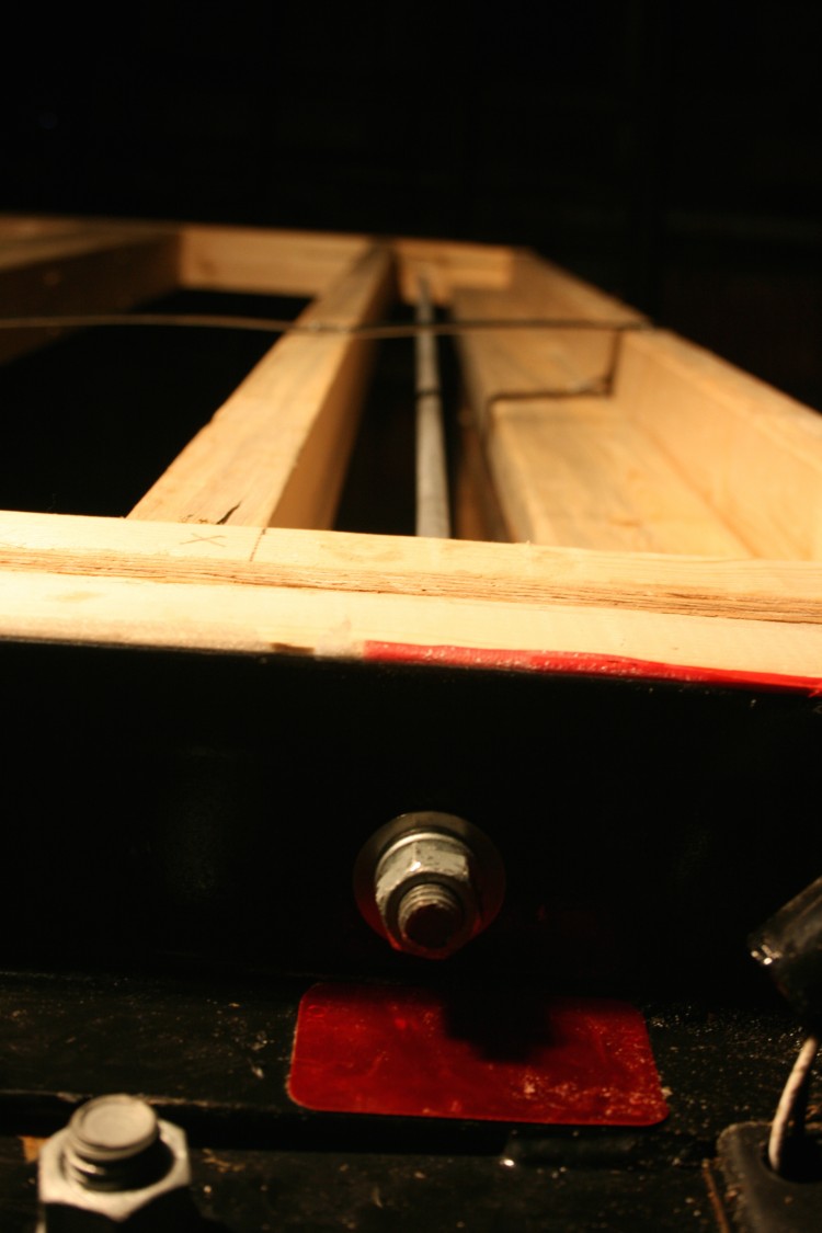 Threaded rods for a metal connection between the trailer and double top plate