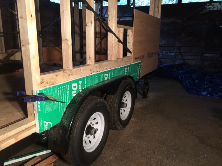 Installing the sheathing around the fenders