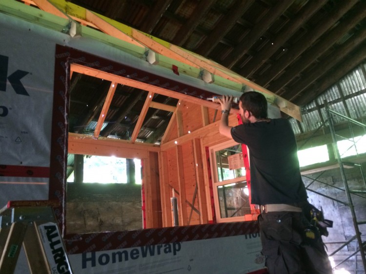 Applying the membrane that will hopefully keep the water out